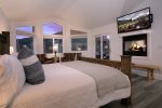 Watch a Movie in the Master Suite of Cozy up to the Fireplace